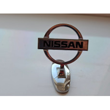 емблема капота "приціл"  Nissan